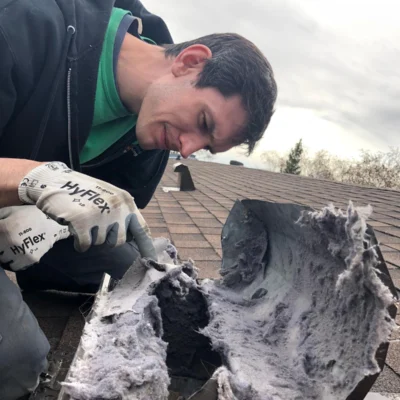 Dryer Vent Gooseneck Action Shot with Greg Before Portrait 2020 04 .02